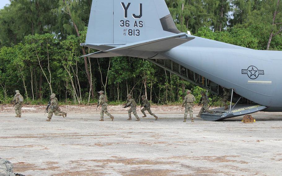 An Air Force C-130 Hercules delivers U.S. troops onto the newly renovated Angaur Airfield for training in the Republic of Palau, Sept. 6, 2020. 
