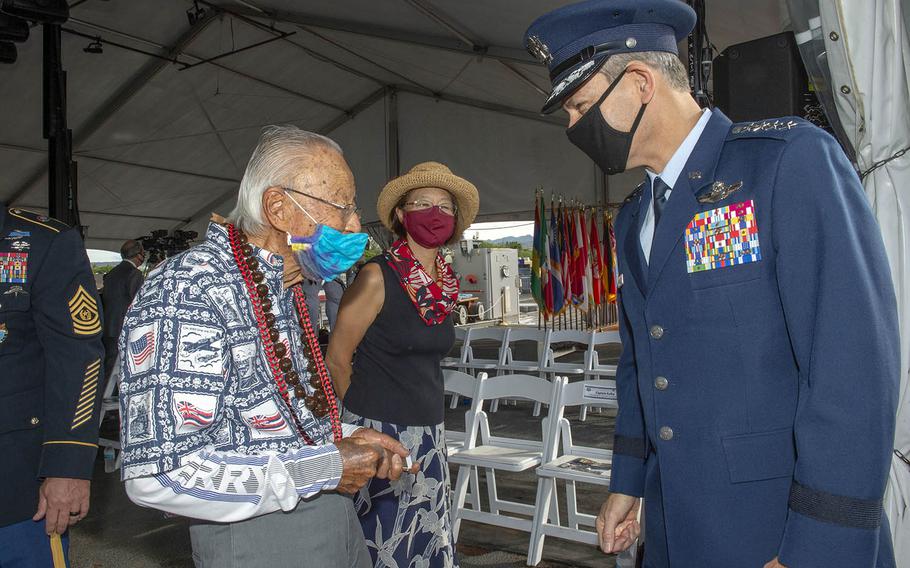 Air Force Gen. Ken Wilsbach, commander of Pacific Air Forces, speaks with World War II veteran Arthur Shak during a ceremony commemorating the 75th anniversary of the end of the war aboard the Battleship Missouri Memorial at Pearl Harbor, Hawaii, Sept. 2, 2020. 