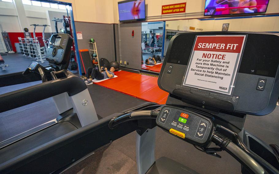 A sign encourages gymgoers to practice social distancing at Marine Corps Air Station Iwakuni, Japan, April 7, 2020. 