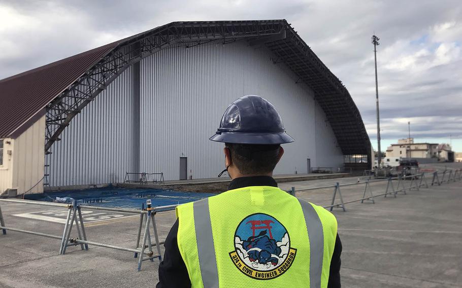 Leigh Ishida, the project team chief for the 374th Civil Engineer Squadron, checks out renovation work for Hangar 15 at Yokota Air Base, Japan, Monday, Nov. 23, 2020.