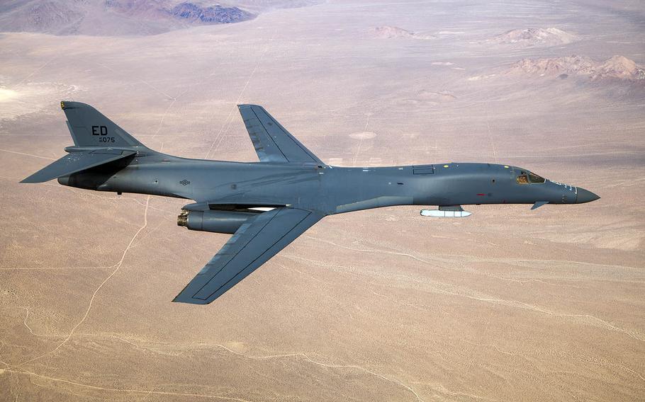 A B-1B Lancer carries an inert external missile during a demonstration over Edwards Air Force Base, Calif., Nov. 20, 2020.