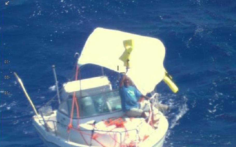 The crew of a Navy P-8A Poseidon spots two mariners missing near the island of Saipan, Monday, Nov. 30, 2020. 