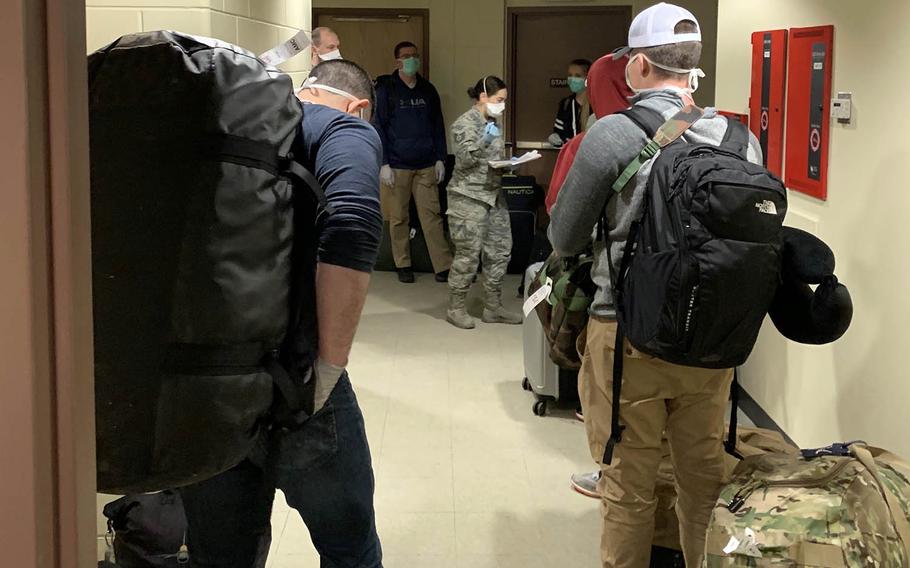 Airmen arrive in quarantine at Osan Air Base, South Korea, March 13, 2020.