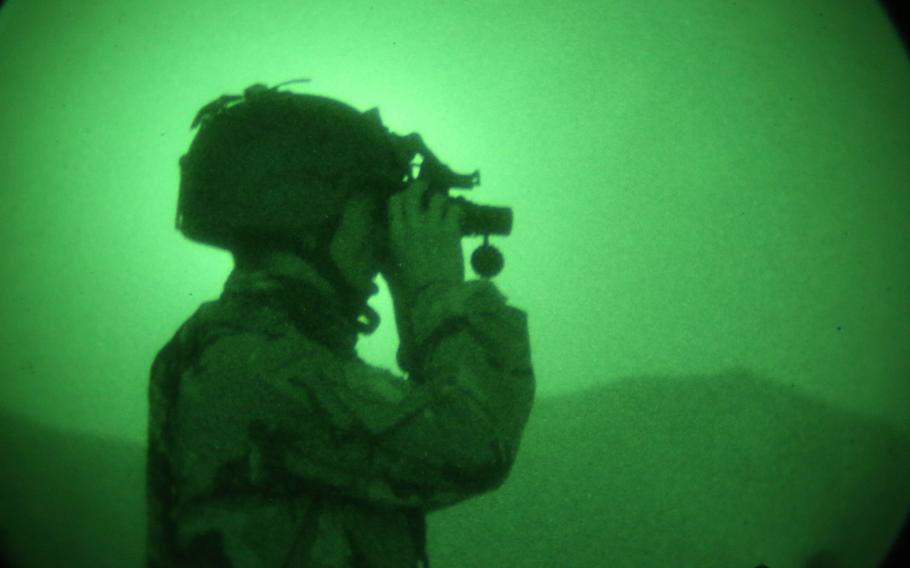 An Afghan National Army commando tests his night vision device during mission preparation in Kabul district, Afghanistan, in 2013. The Defense Department has failed to keep track of military equipment including surveillance systems, controls for laser-guided bombs and night vision devices that were provided to the Afghan government, the Special Inspector General for Afghanistan said in a report released Thursday, Dec. 17, 2020. 
