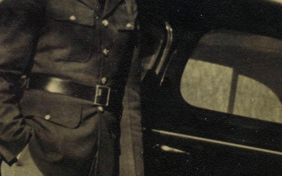 Daniel Crowley poses in his uniform in this undated photo taken before he shipped out for the Philippines in 1940.