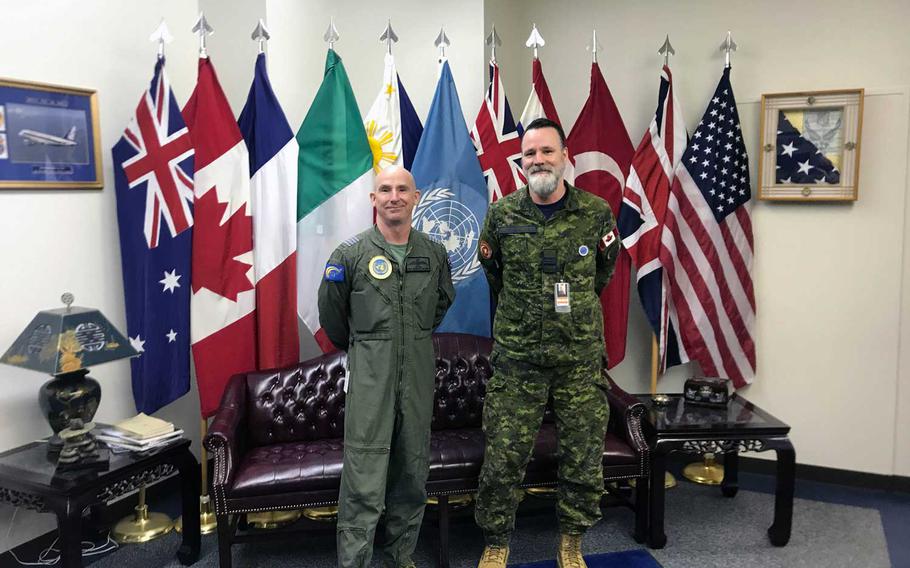 United Nations Command's Rear commander Royal Australian Air Force Col. Adam Williams, left, and deputy commander, Royal Canadian Air Force Maj. Leon Hachey at their office on Yokota Air Base, Japan, Nov. 24, 2020. 