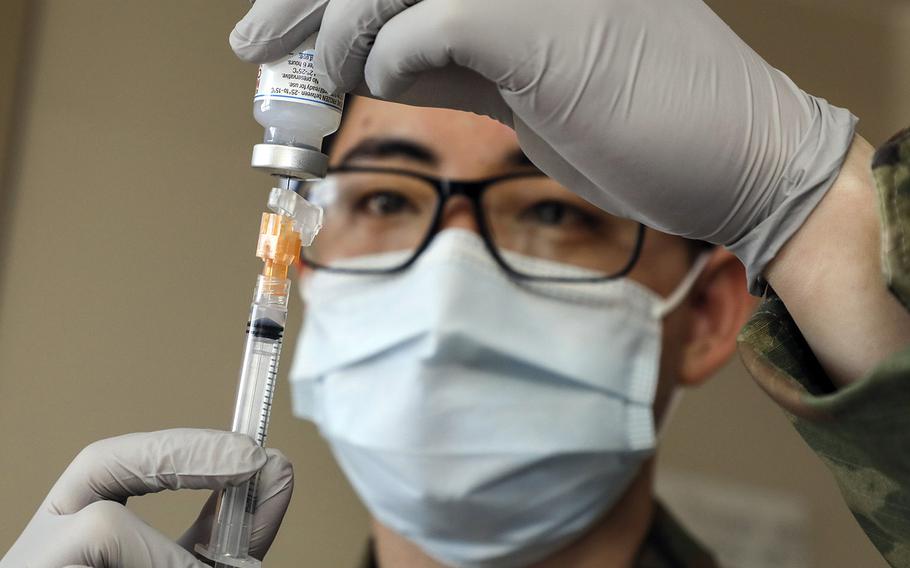 A dose of the Moderna coronavirus vaccine is prepared at Brian D. Allgood Army Community Hospital on Camp Humphreys, South Korea, Jan. 13, 2021. 