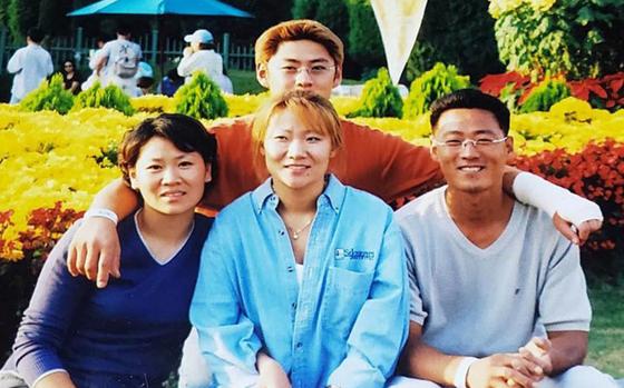 Hyon Chu DuCharme, center, poses with her siblings in this undated family photo.