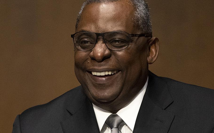 Retired Gen. Lloyd J. Austin III reacts to a question about being married for 41 years during his Senate Armed Forces Committee confirmation hearing in Washington, D.C. Jan. 19, 2021.