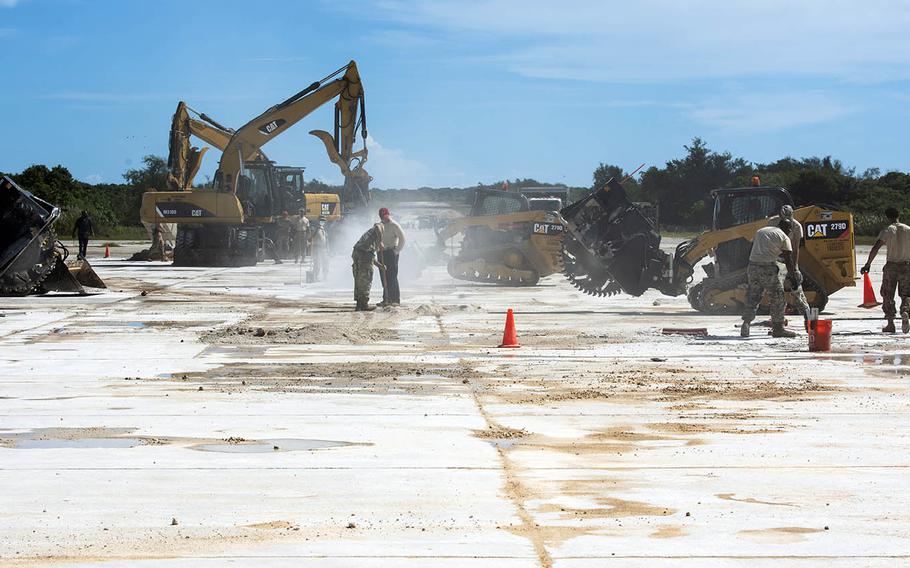 Airmen conduct rapid airfield damage repair on the flight line of Northwest Field at Andersen Air Force Base, Guam, Oct. 15, 2019. 