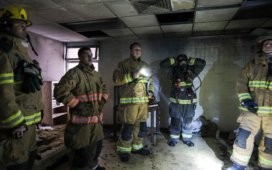 Firefighters with the 51st Fighter Wing prepare for "live fire" training at Osan Air Base, South Korea, Jan. 22, 2021.
