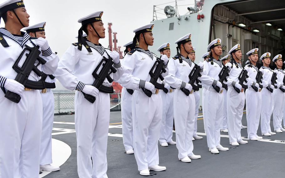 Members of the Submarine Academy in Qingdao, China, stand at attention during a visit by the United States' chief of naval operations, July 20, 2016.