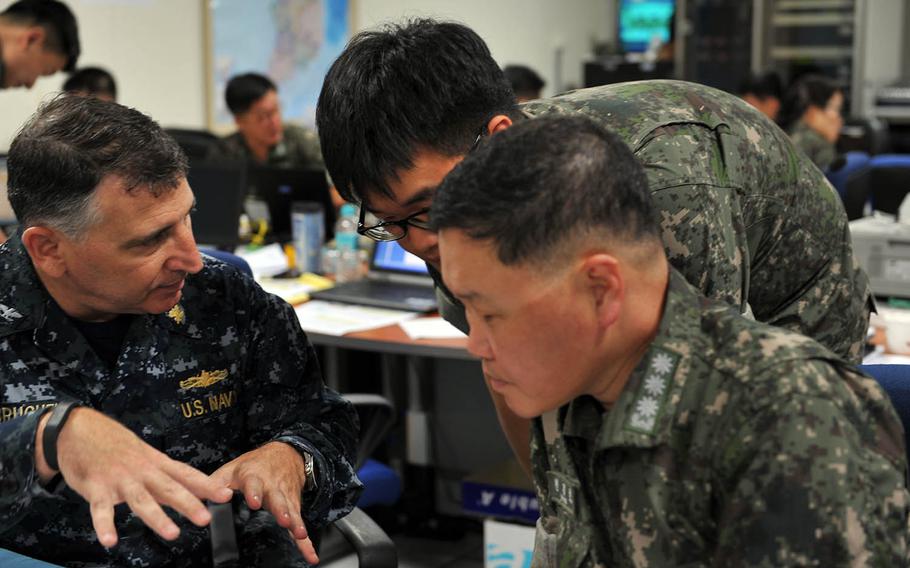 American and South Korean sailors work together during the Ulchi Freedom Guardian exercise in August 2014. 