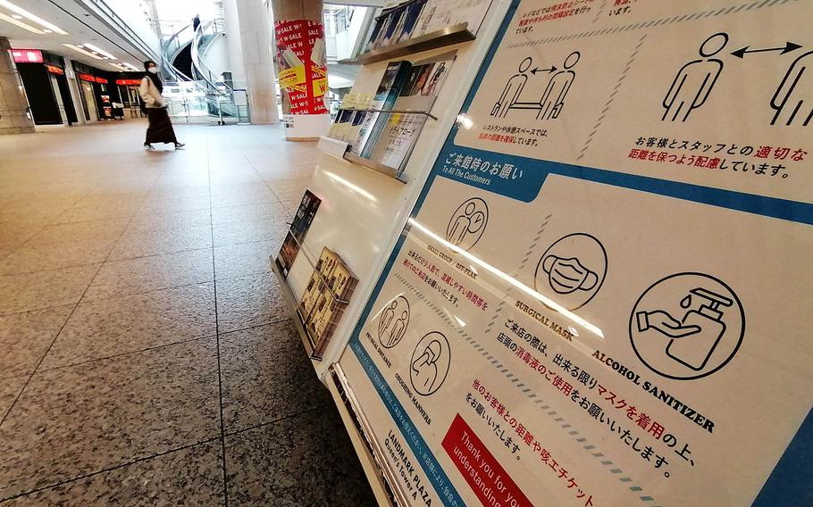 A shopping center in Yokohama, Japan, encourages customers to take measures to prevent a coronavirus infection on Jan. 6, 2021.