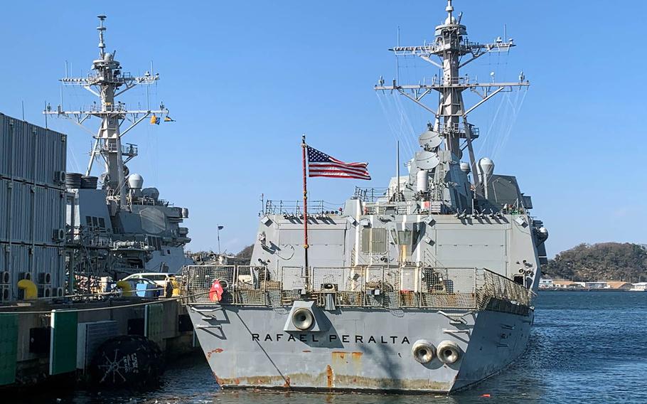 The guided-missile destroyer USS Rafael Peralta docks at Yokosuka Naval Base, Japan, Thursday, Feb. 4, 2021.