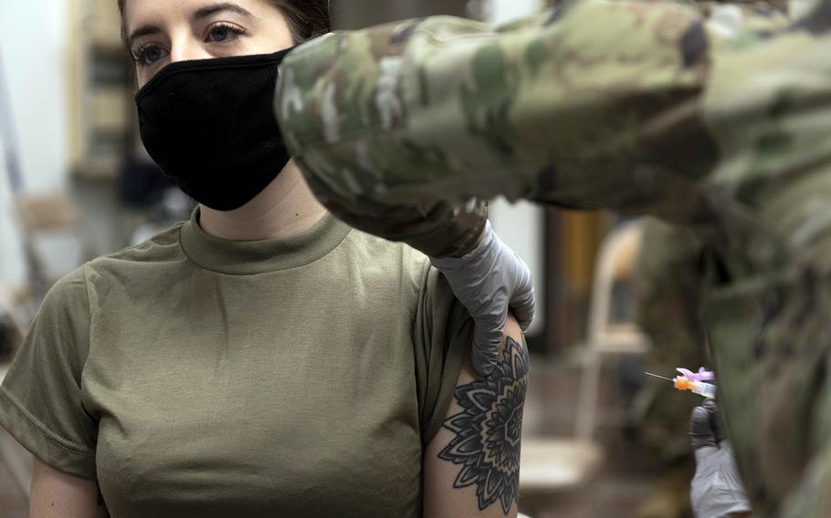 Senior Airman Kassidy Peters receives her first dose of the Moderna COVID-19 vaccine at Osan Air Base, South Korea, Dec. 29, 2020.