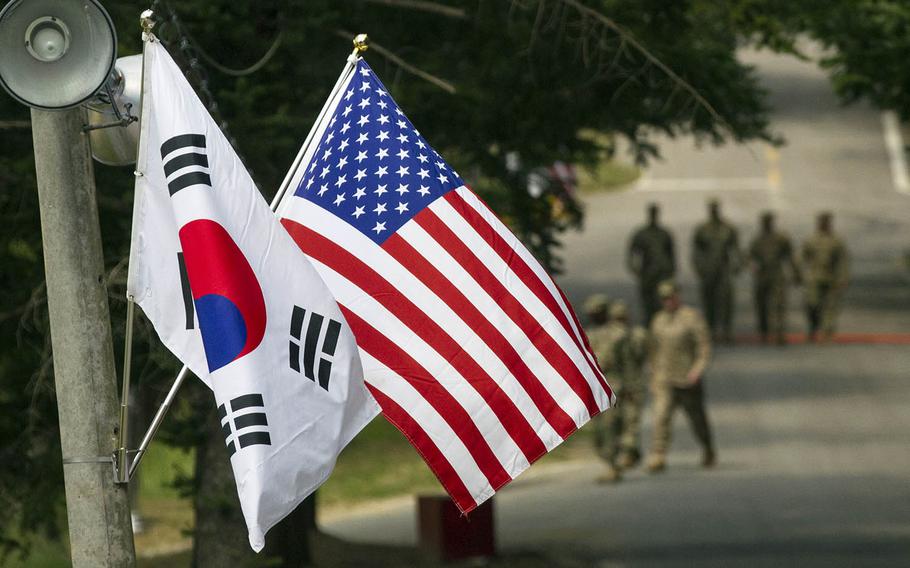 South Korean and American flags fly next to each other at Yongin, South Korea, Aug. 23, 2016.