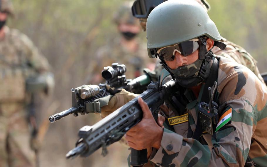 Soldiers with India's 11th Jammu And Kashmir Rifles Battalion and the U.S. Army's 2-3 Infantry Patriots Battalion, 1-2 Stryker Brigade Combat Team, practice small-unit infantry tactics during the Yudh Abhyas exercise in India being held through Feb. 21, 2021.