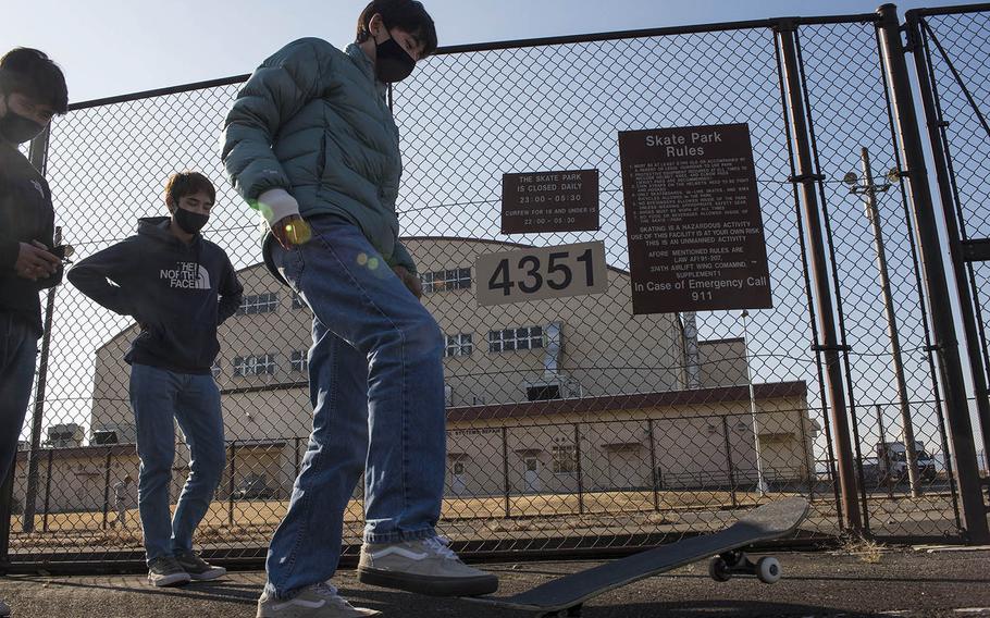 Yokota High School student Thomas Vogeley, 15, stands with his friends outside the site of a demolished skate park at Yokota Air Base, Japan, Tuesday, Feb. 9, 2021.