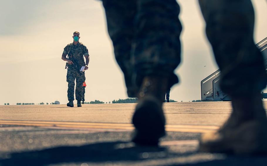 Members of Marine Rotational Force — Darwin arrive at Royal Australian Air Force Base Darwin in the Northern Territory, July 8, 2020. 