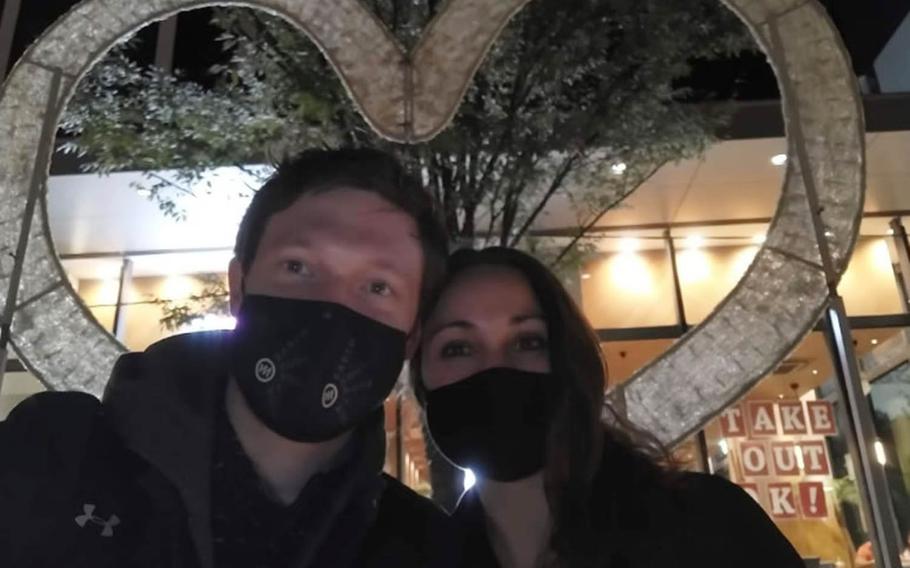 Trevor and Britni Balint pose together in an undated photo. Trevor, 34, was reported missing from Yokota Air Base, Japan, Feb. 1, 2021.