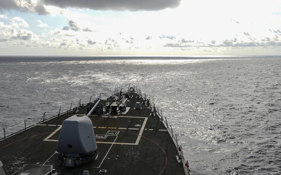 The guided-missile destroyer USS Russell transits the South China Sea, Wednesday, Feb. 17, 2021. 