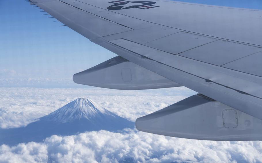 An Air Force E-4B flies west of Mount Fuji, Japan, Dec. 7, 2016. 