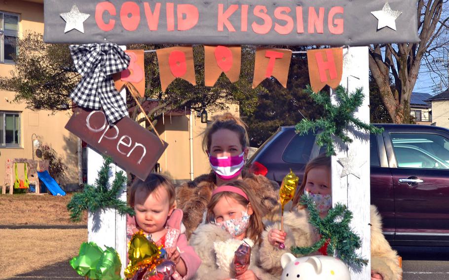 Ashley Stewart and her husband, Maj. Adam Stewart of the 36th Airlift Squadron at Yokota Air Base in Tokyo, used their spare time during the pandemic to round up donations to purchase new toys and furniture for the playroom in a creative way. They built a "COVID Kissing" booth that tenders balloons and Hershey's Kisses at changing locations in the base housing areas and parks.