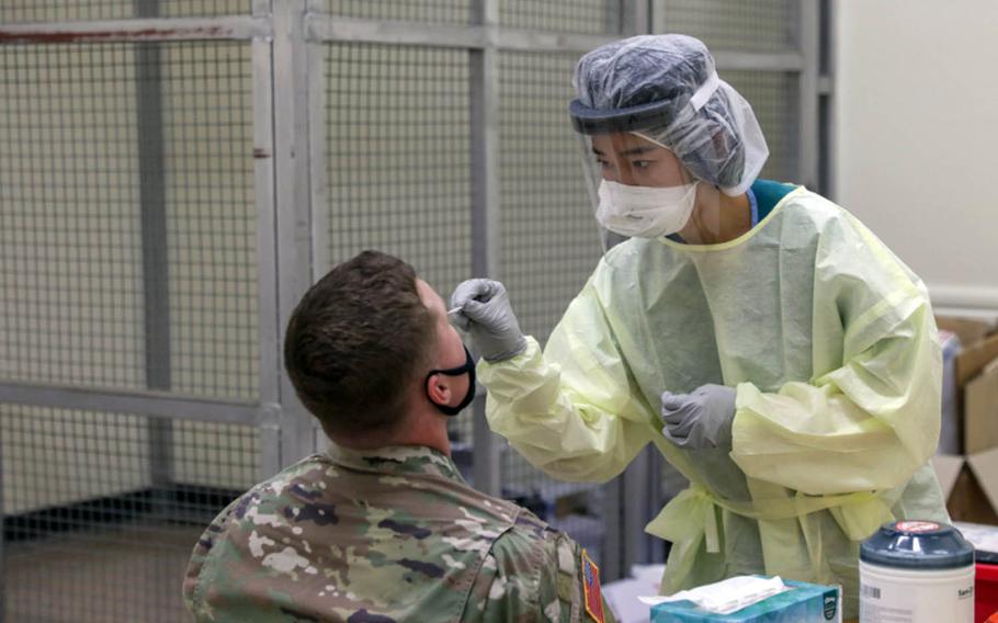 A soldier is tested for COVID-19, the respiratory caused by the coronavirus, at Camp Humphreys, South Korea, Jan. 22, 2021.