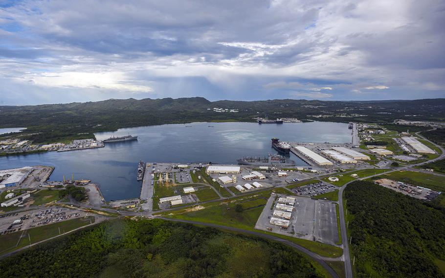 This aerial view of Naval Base Guam shows Apra Harbor with several Navy vessels in port, Aug. 24, 2020.