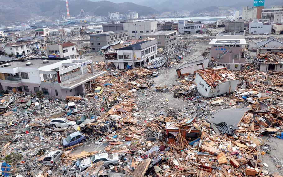 In this photo taken by former Stars and Stripes reporter Tim Flack, the coastal fishing village of Ofunato, Japan, looks like a war zone following the earthquake and tsunami of March 11, 2011. 