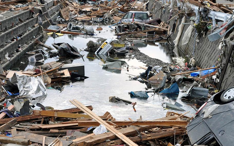 In this photo taken by former Stars and Stripes reporter Tim Flack, the coastal fishing village of Ofunato, Japan, looks like a war zone following the earthquake and tsunami of March 11, 2011.