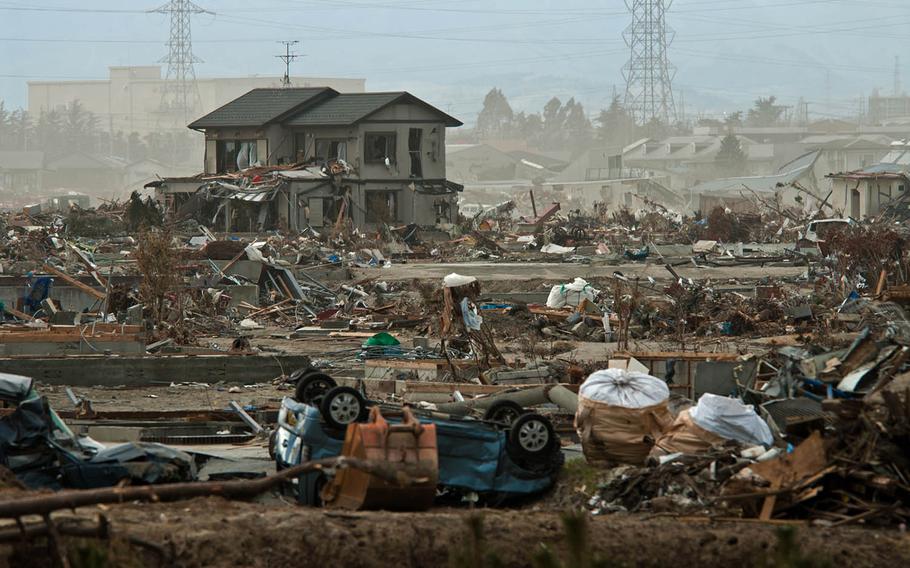 Wreckage waits to be cleared from the tsunami devastated Nagahama Beach area of Sendai, Japan, April 8, 2011. 