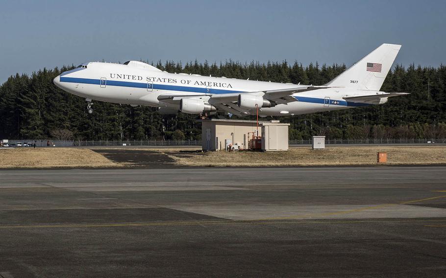 A Boeing E-4B carrying Secretary of Defense Lloyd Austin comes in for a landing at Yokota Air Base, Japan, Monday, March 15, 2021. 
