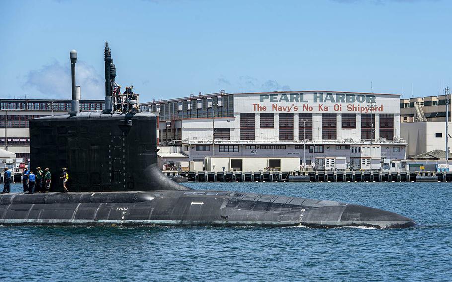 A Virginia-class fast-attack submarine departs Pearl Harbor Naval Shipyard in Hawaii, May 10, 2020. 