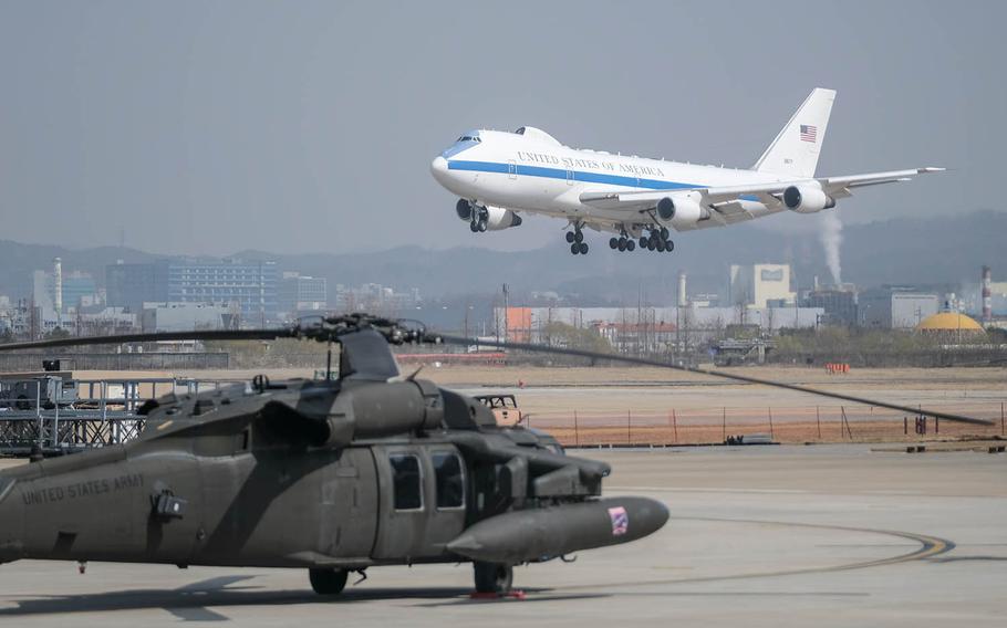 A plane carrying Defense Secretary Lloyd Austin prepares to touch down at Osan Air Base, South Korea, Wednesday, March 17, 2021. 