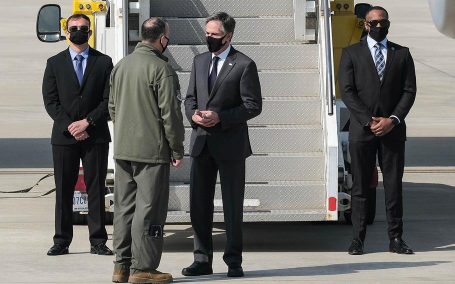 Secretary of State Antony Blinken chats with the 7th Air Force commander, Lt. Gen. Scott Pleus, after landing at Osan Air Base, South Korea, Wednesday, March 17, 2021. 