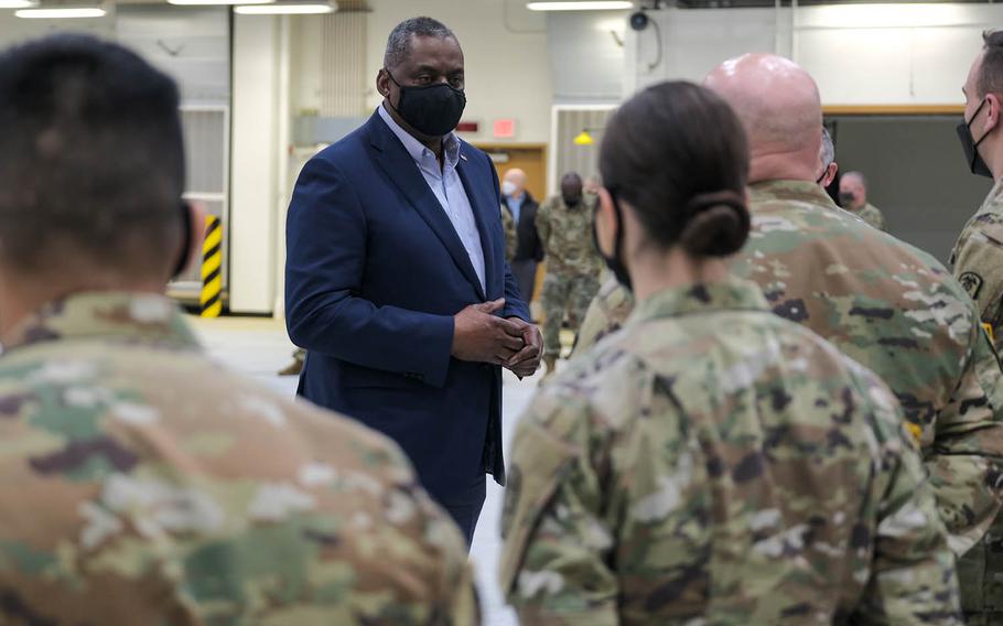 Defense Secretary Lloyd Austin speaks with service members at Osan Air Base, South Korea, Friday, March 19, 2021.