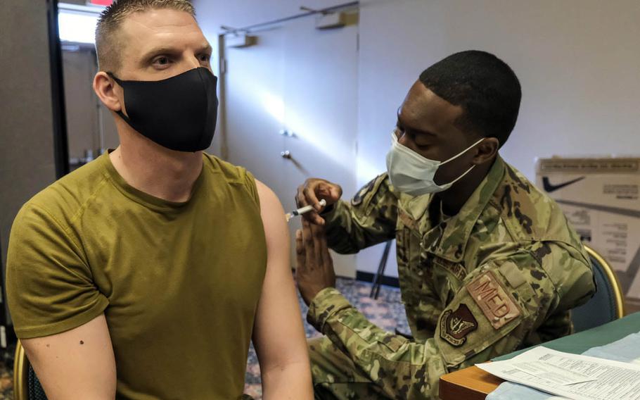 An airman assigned to the 51st Fighter Wing receives the Jannsen COVID-19 vaccine at Osan Air Base, South Korea, March 11, 2021.