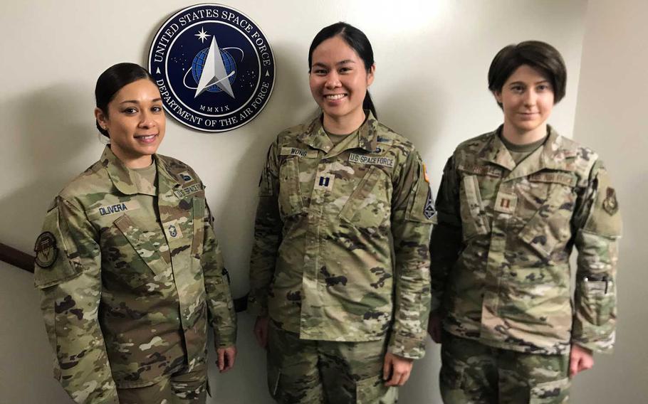 Space Force members, from left, Senior Master Sgt.  Marivic Olivera and Capt. Jessica Wong, shown here with Air Force Capt. Laura Marshall on March 24, 2021, signed up at Yokota Air Base, Japan.