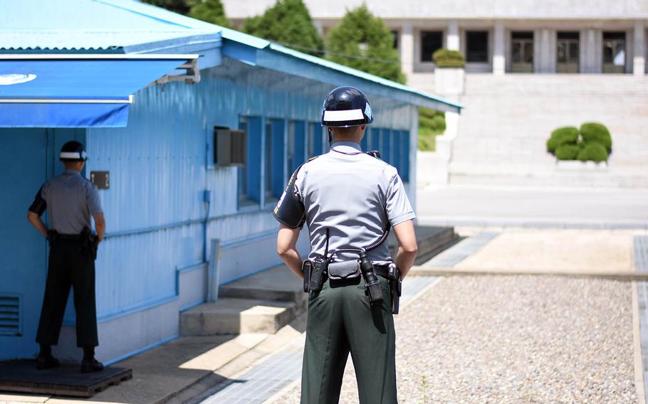 South Korean soldiers stand guard near the border with North Korea inside the Joint Security Area, May 24, 2017.