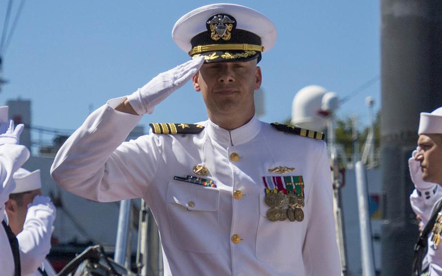 Cmdr. Joseph Lautenslager is piped ashore during the USS Charlotte (SSN 766) change of command ceremony at Joint Base Pearl Harbor-Hickam on March 15, 2019. Lautenslager was relieved of command of the Los Angeles-class fast-attack submarine on Tuesday, April 27, 2021, after a command investigation.