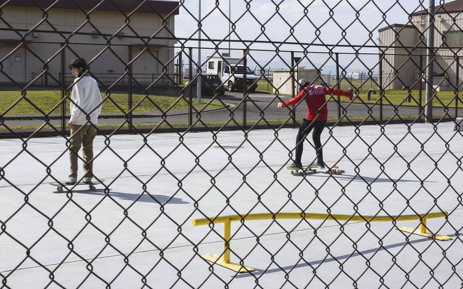 Thomas Vogeley, 15, left, and Ben Wellons, 13, enjoy the newly renovated skate park at Yokota Air Base, Japan, Friday, April 30, 2021. 