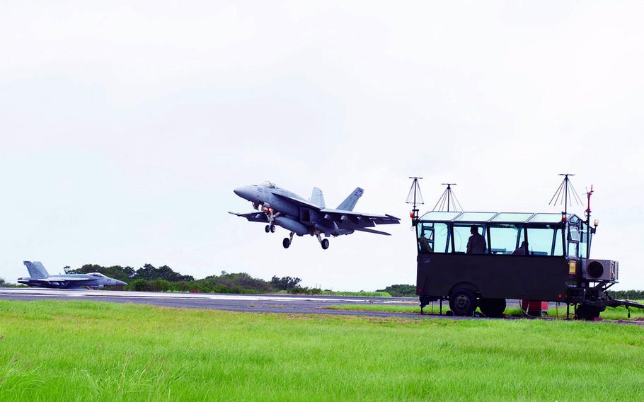 F/A-18s from Carrier Air Wing 5 at Marine Corps Air Station Iwakuni, Japan, take part in field carrier-landing practice on Iwo Jima in 2019.