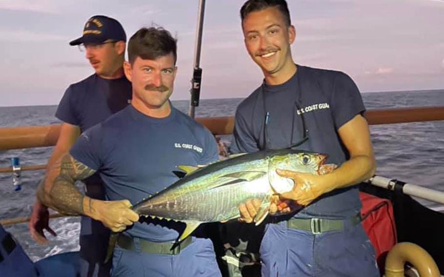 Crew members of the Coast Guard cutter Frederick Hatch pose with their catch during a fish call earlier this month near Mexico. 