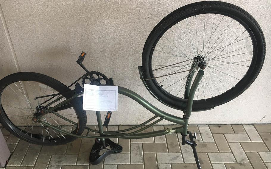 This abandoned bicycle, recently tagged for removal at Marine Corps Air Station Iwakuni, Japan, is one of hundreds that may be sold for scrap to raise money for programs that help service members. 