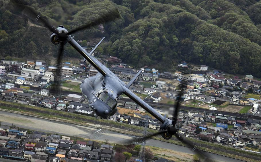 An Air Force CV-22 Osprey tiltrotor aircraft assigned to the 353rd Special Operations Group flies over Tokyo, April 5, 2018.