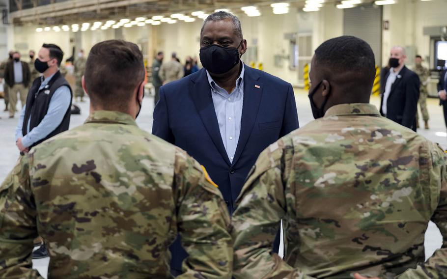 Defense Secretary Lloyd Austin speaks with service members at Osan Air Base, South Korea, Friday, March 19, 2021.
