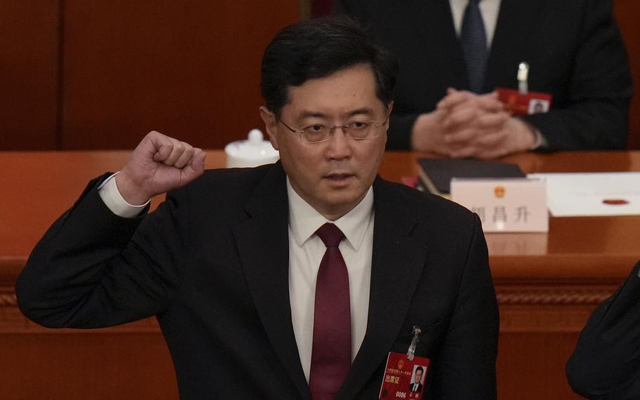 Newly elected Chinese Foreign Minister Qin Gang takes his oath during a session of China's National People's Congress (NPC) at the Great Hall of the People in Beijing on March 12, 2023. In a rare phone conversation with his Ukrainian counterpart on Thursday, March 16, China's foreign minister says Beijing is concerned about the year-old grinding conflict with Russia spinning out of control and urged talks on a political solution with Moscow. 