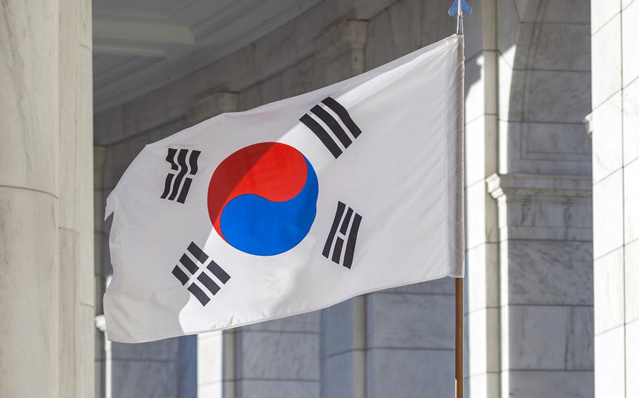 A South Korean flag is carried at Arlington National Cemetery in Arlington, Va., Oct. 25, 2018.